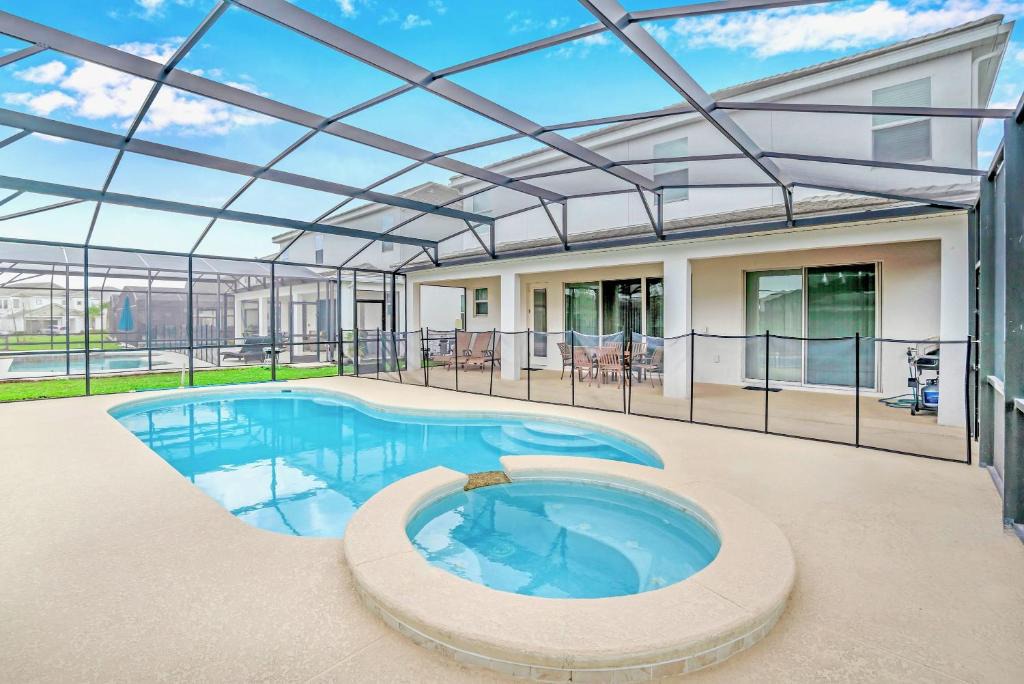 Kissimmee House | 10BR - Family Home Near Disney with Pool & BBQ