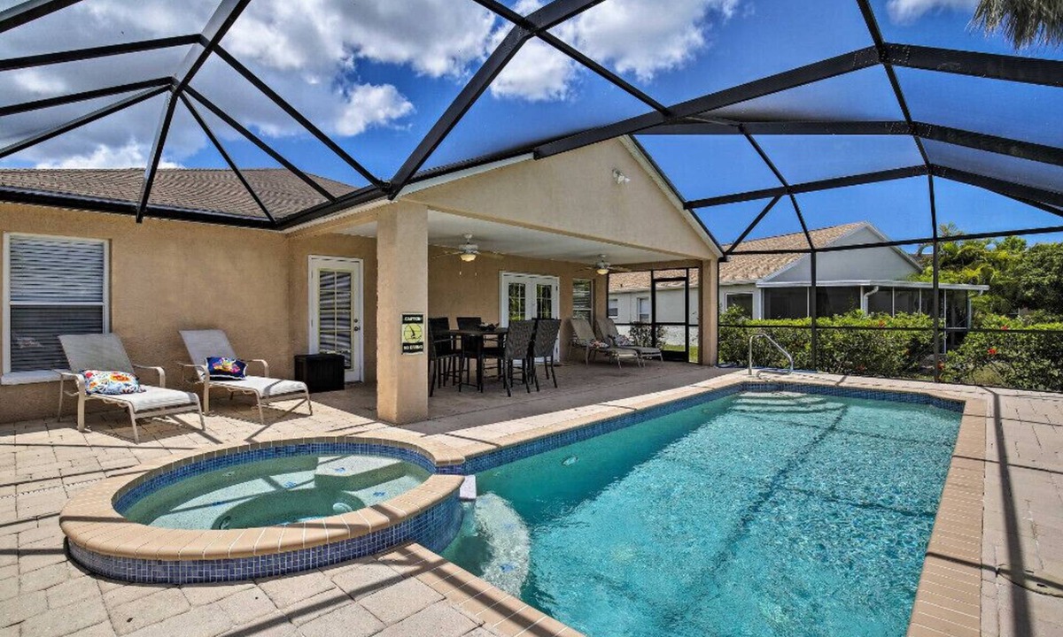 Sabal Harbour House | 4 BR Home w/Lanai & Saltwater Pool/Spa and Lake View!