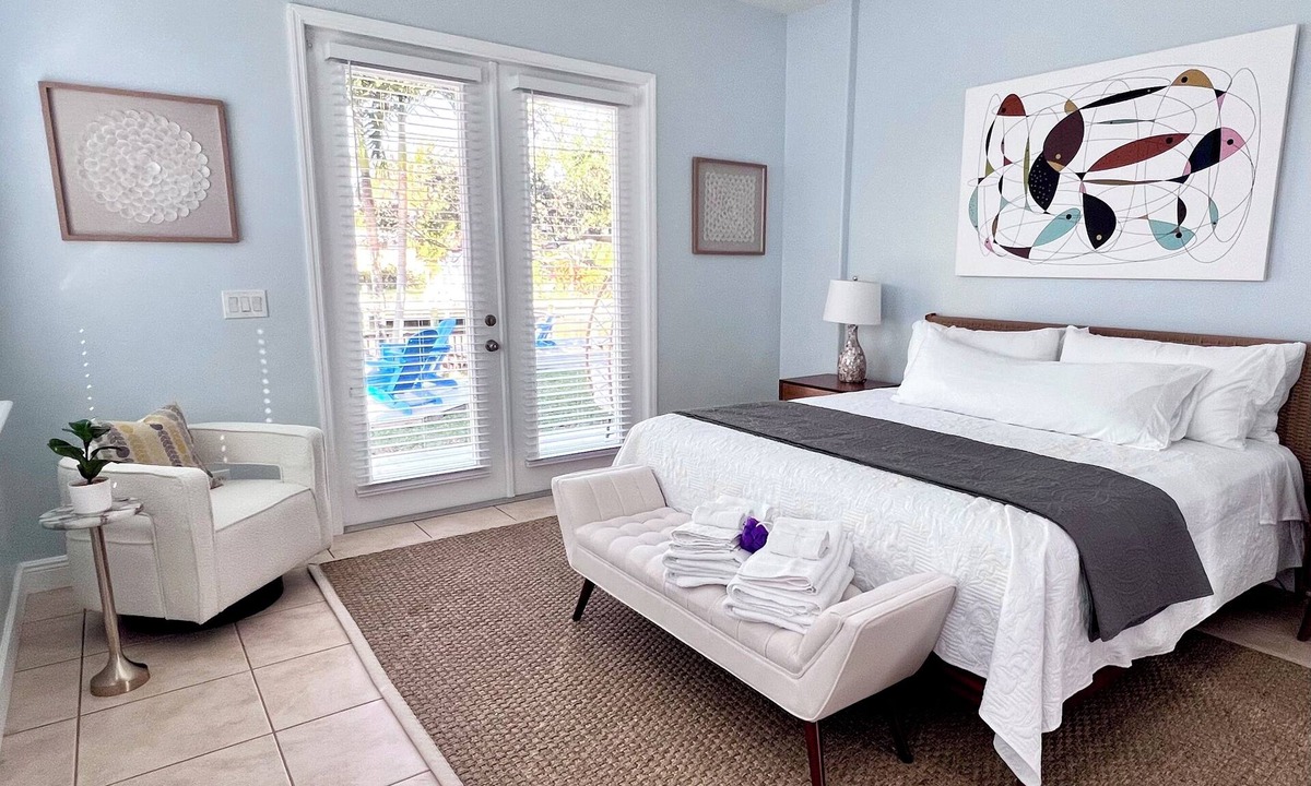 Cocoa Beach House | 4BR Private Canal Home Near Beach: Hot Tub, Tiki Bar, Fire Pit, Dock & Game Room