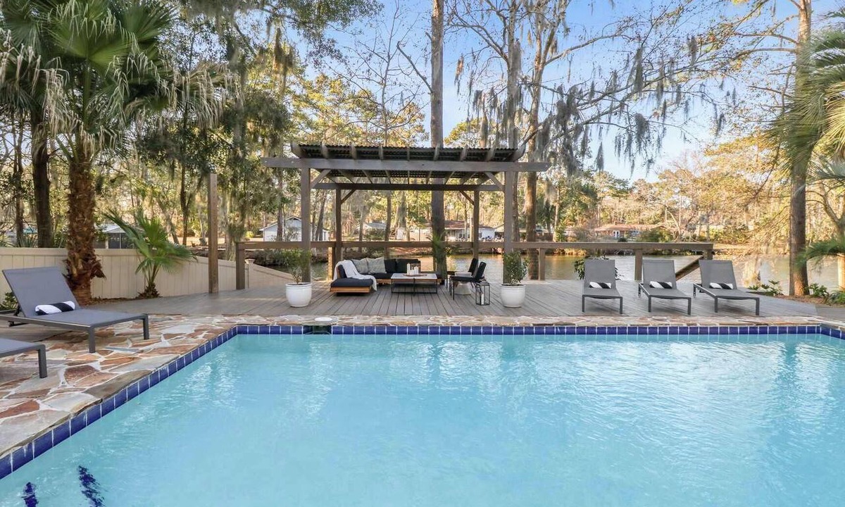 Talahi Island House | 8BR Lakefront Estate | Pool, Hot Tub & Lake Access