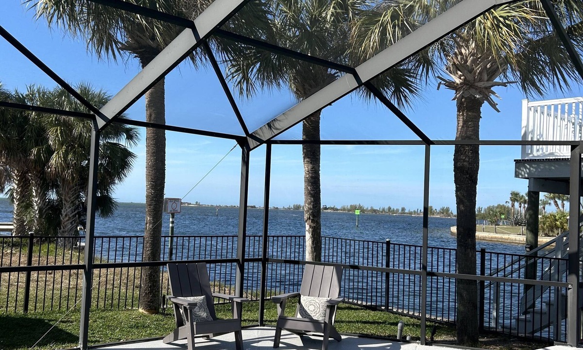 Spring Hill House | Amazing views, Dolphins, And Sunsets!nnWaterfront property with pool and dock.
