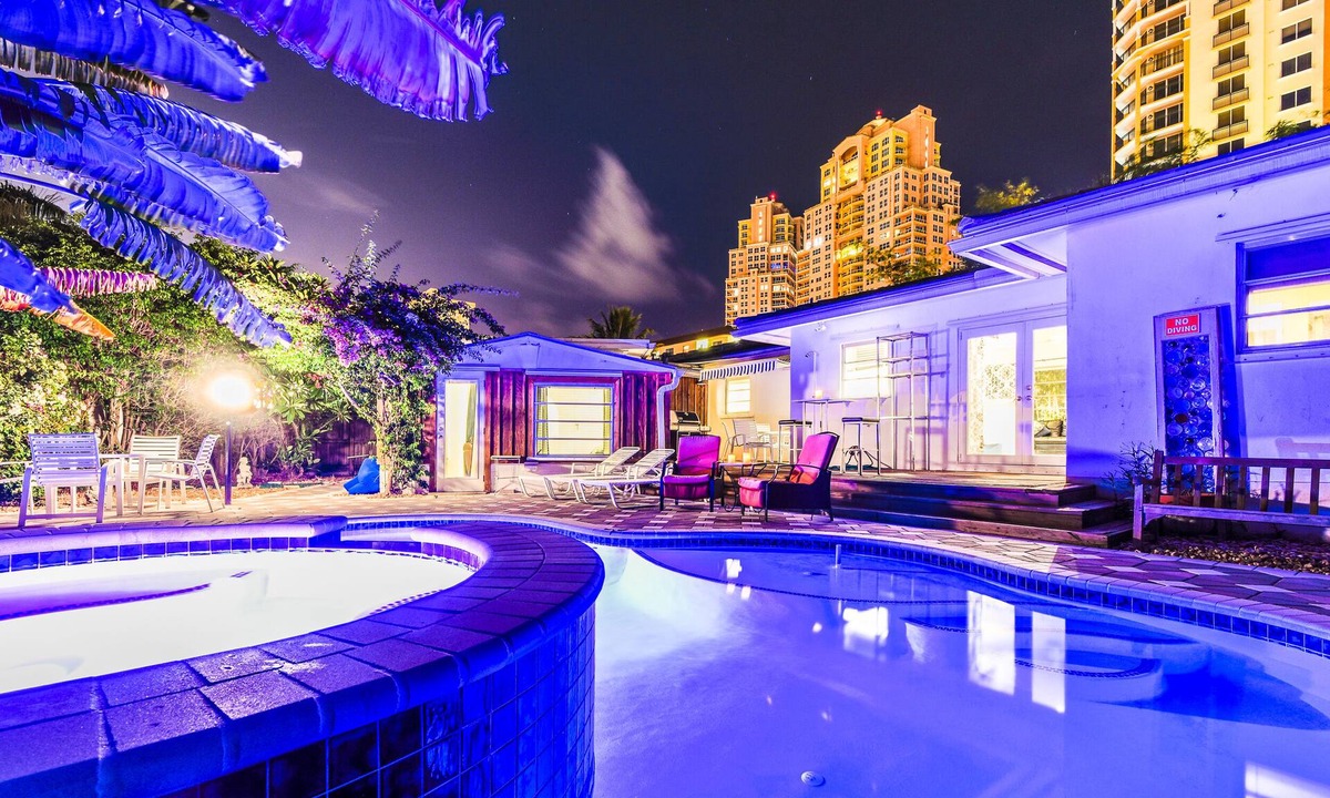 Dolphin Isles House | Bamboo House, Heated pool, Steps from the beach.