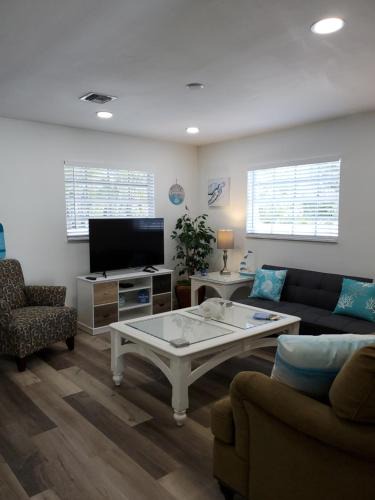 Fort Myers Beach House | Beach Style lake view home with boat parking & minutes to the best beaches!