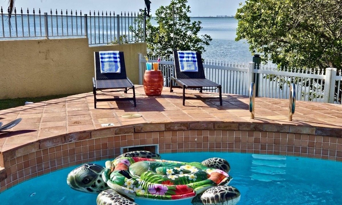 Banana River Estates House | Beautiful River Front Home - Private Pool - Walk to Beach-Kayaks