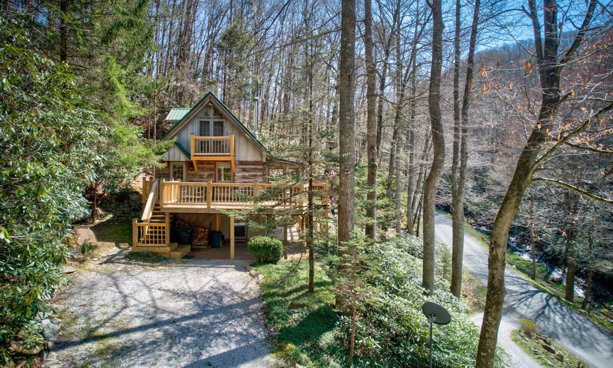 Elk Park House | Creeksong Cabin - log home with fire pit, large creek on property