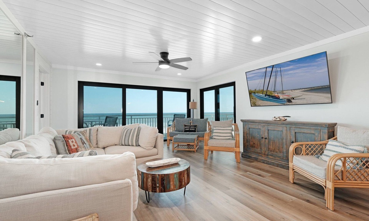 New Smyrna Beach Condo | Direct oceanfront condo with a large balcony, heated pool, and beach access