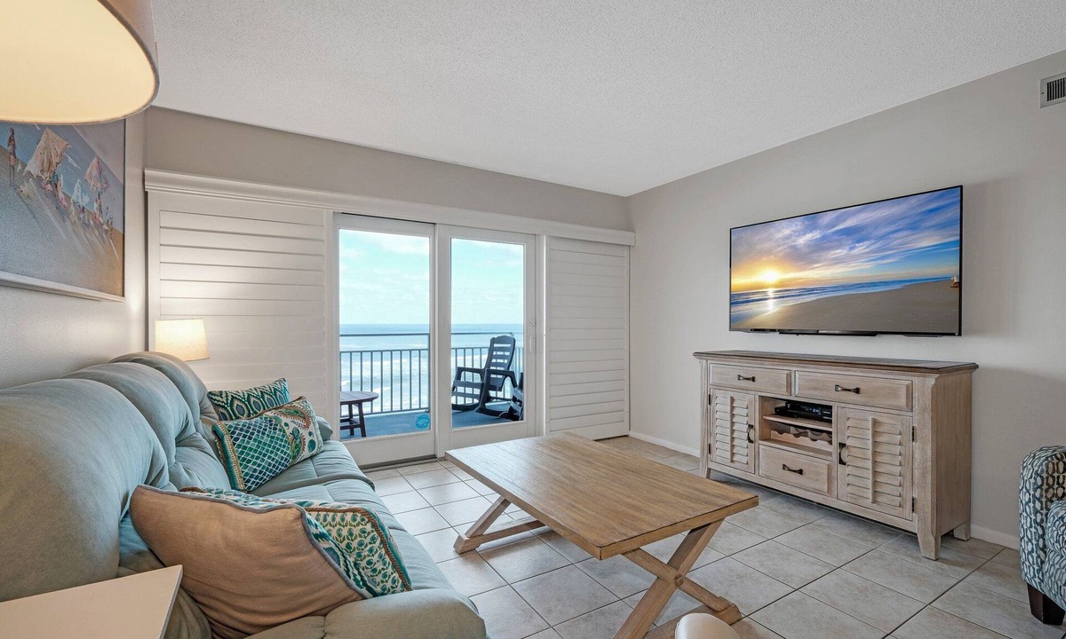 New Smyrna Beach Condo | Direct oceanfront condo with private balcony, heated beachfront pool, and beach access