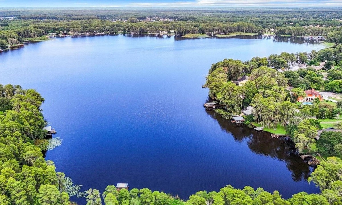 Land O' Lakes Cabin | Discover tucked away 5-bedroom lakefront cabin getaway in Land O' Lakes with AC