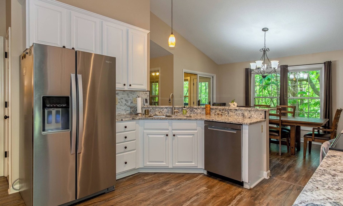 Brevard House | Experience comfort at Deer Moments, a spacious 3BR home in scenic Connestee Falls, NC.