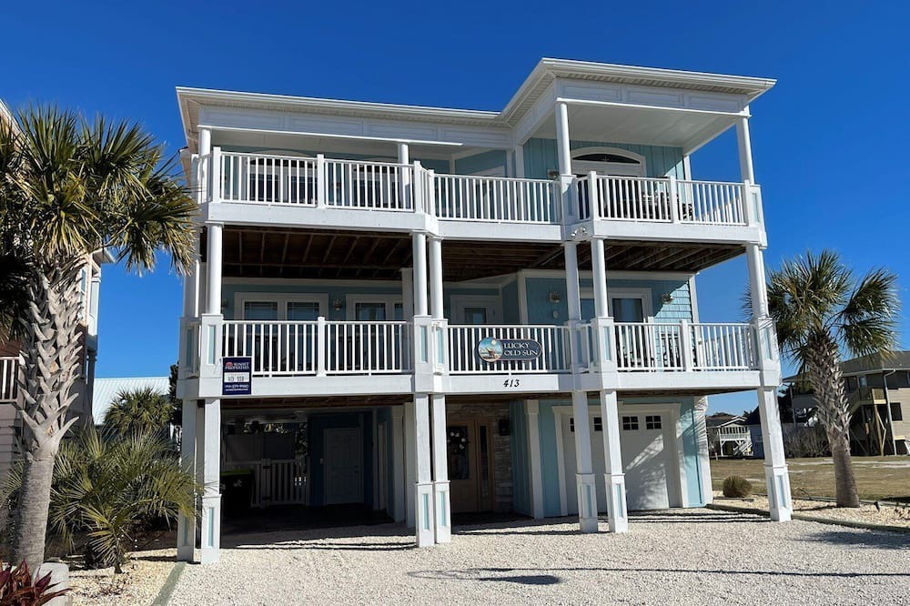 Sea Trail House | Experience luxury at 413 SSB - Lucky Old Sun: a 5BR 5BA retreat in beautiful Sunset Beach.