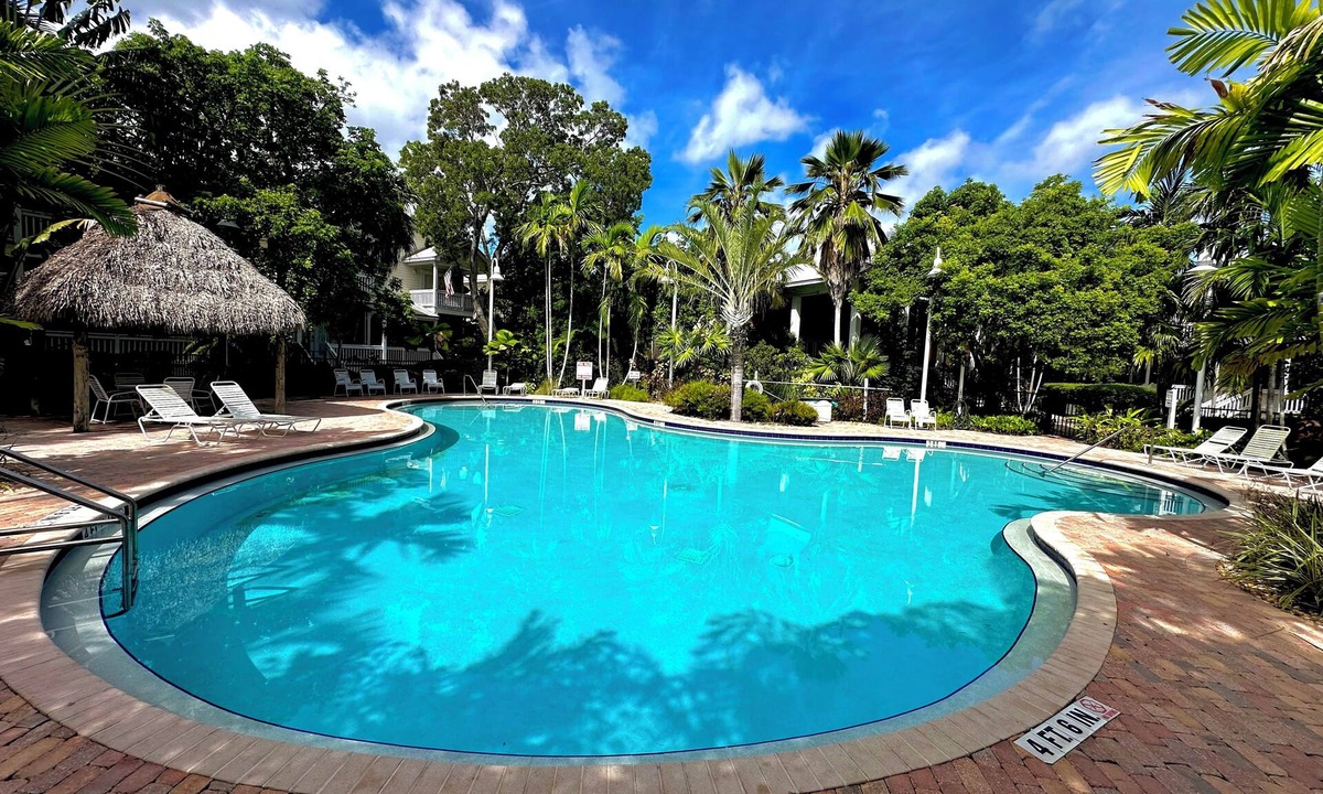 Key West House | Funky Chicken Cottage with shared pool, 3 bed 3 bath minutes from Key West