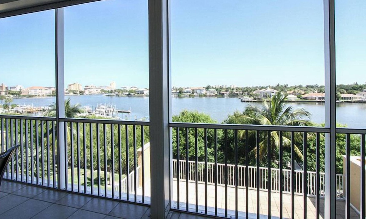 Vanderbilt Beach Condo | Great location! 2 blocks from the beach. End unit with beautiful bay views...