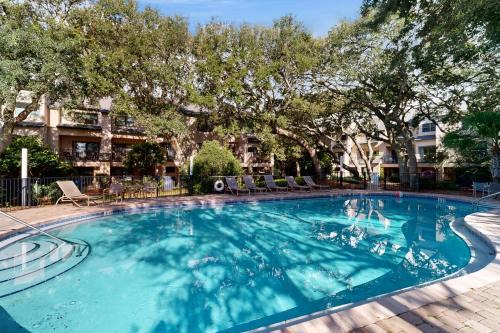 Amelia City House | Ground-floor summer beach village condo with a great view plus patio & pool