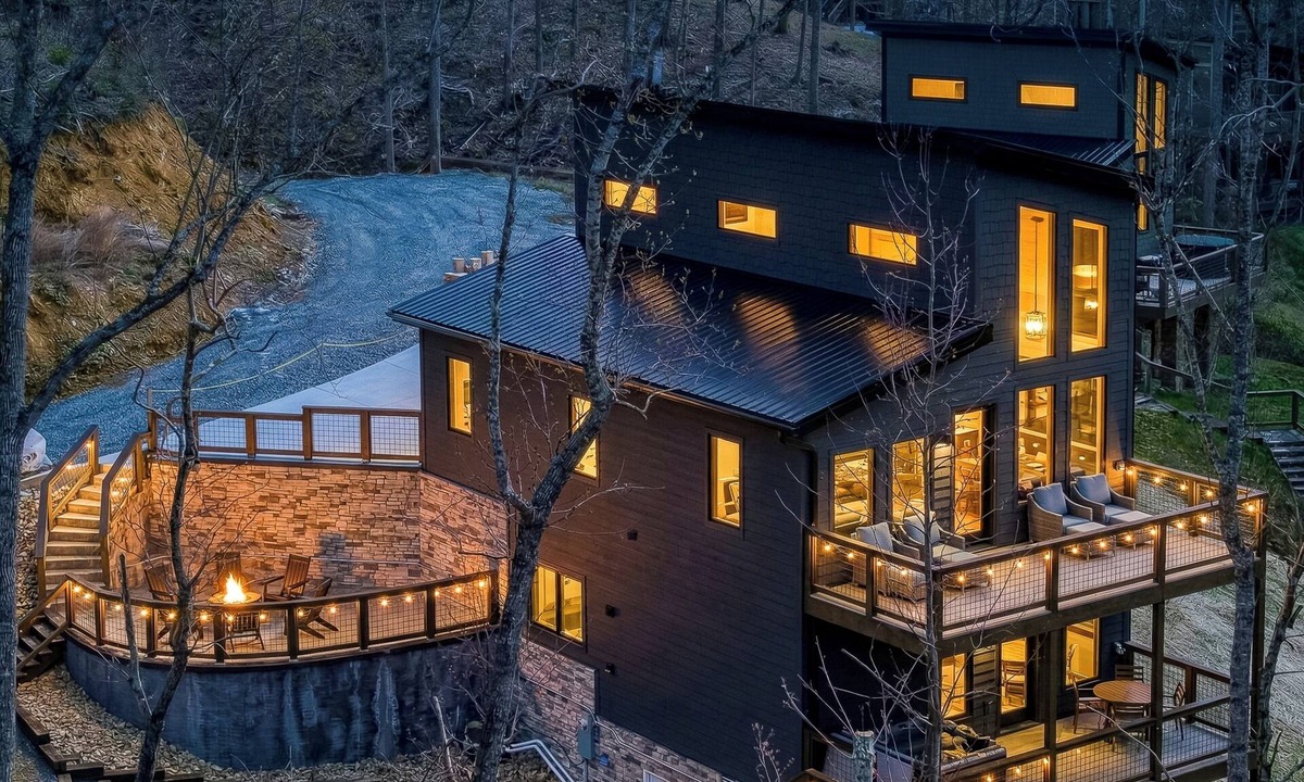 Gatlinburg - Pigeon Forge Ski Chalet | Header: Whiskey Splash | Indoor Pool · Hot Tub · 75-Ft Waterfall · Sleeps 10