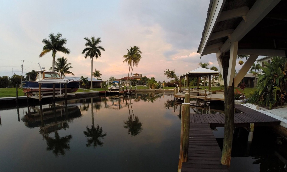 Saint James City House | Immaculate Waterfront Home With Heated Pool. Pet Friendly.
