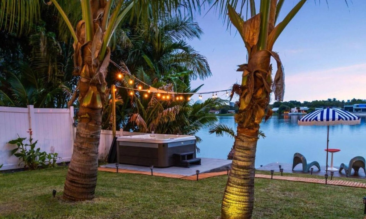 North Miami Beach Villa | Lakefront Tropical Villa by Glam Homes