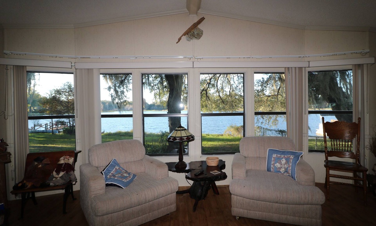 Hernando House | Lakeview from your living room. Water touches the back yard.