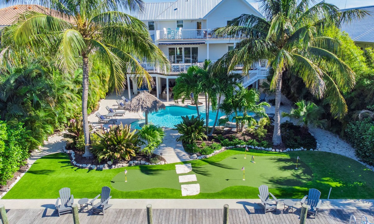 Anna Maria House | Large Canal Front Family Rental on Anna Maria with Pool, Dock & Mini Golf!