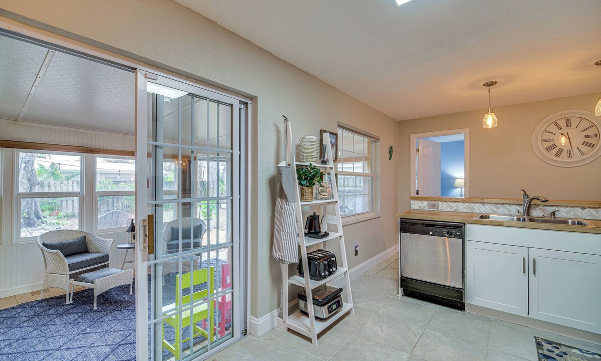 Surfside Estates Cottage | Lovely Merritt Island Home w/Kayak + Fire Pit!