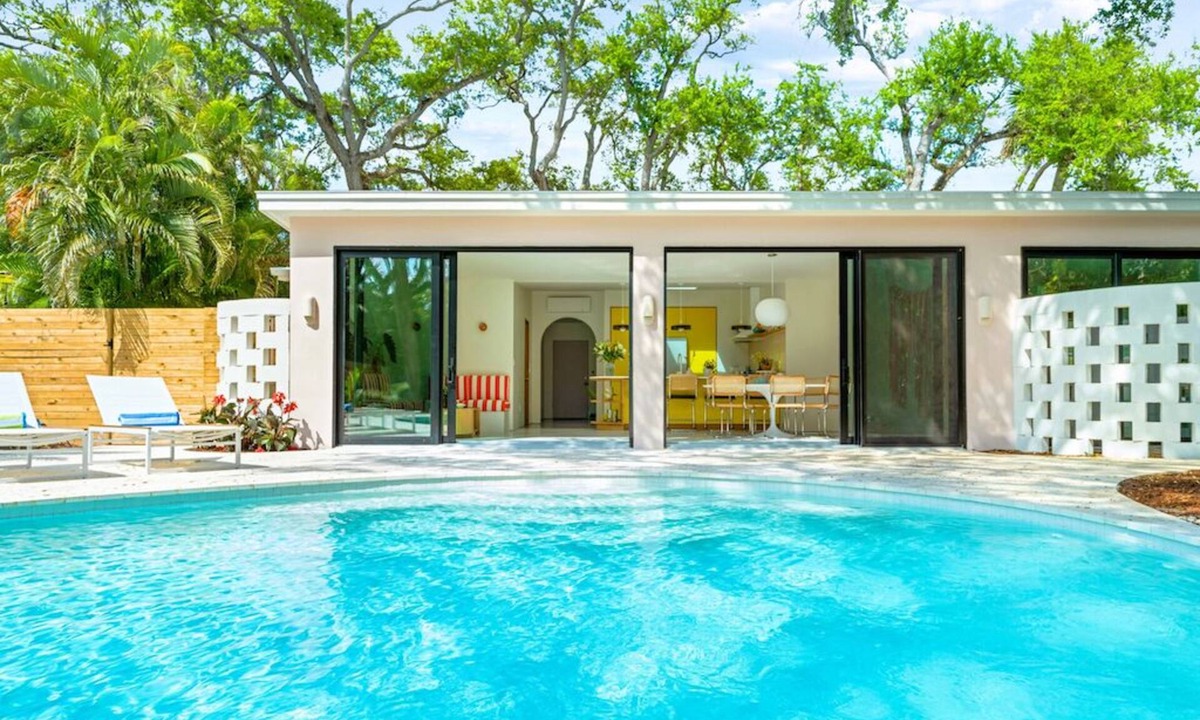 Central Beach House | Luxury 3BR, 3BA w/heated saltwater pool–10min walk to Beach, Shops, Restaurants!