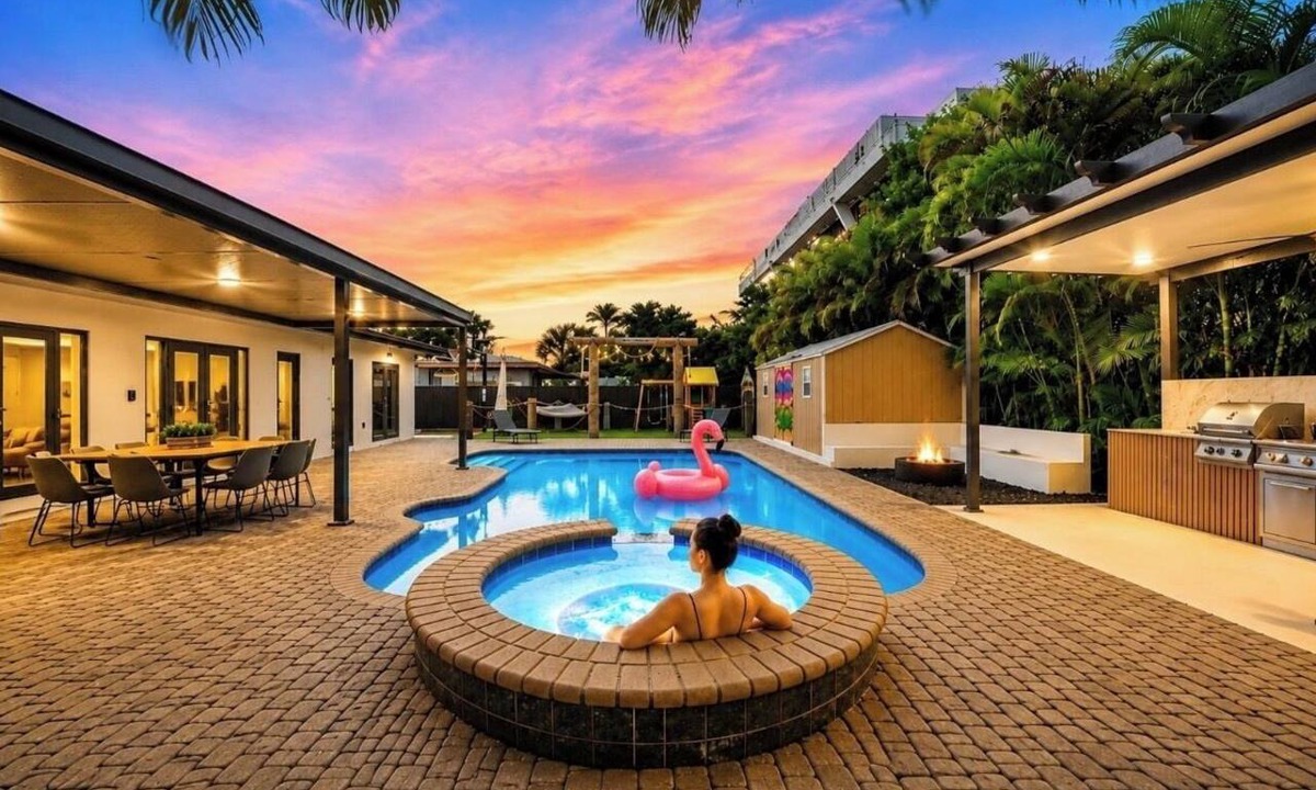 Hialeah House | Luxury 6BR Oasis w/Pool, Fire Pit & Game Area Sleeps 18