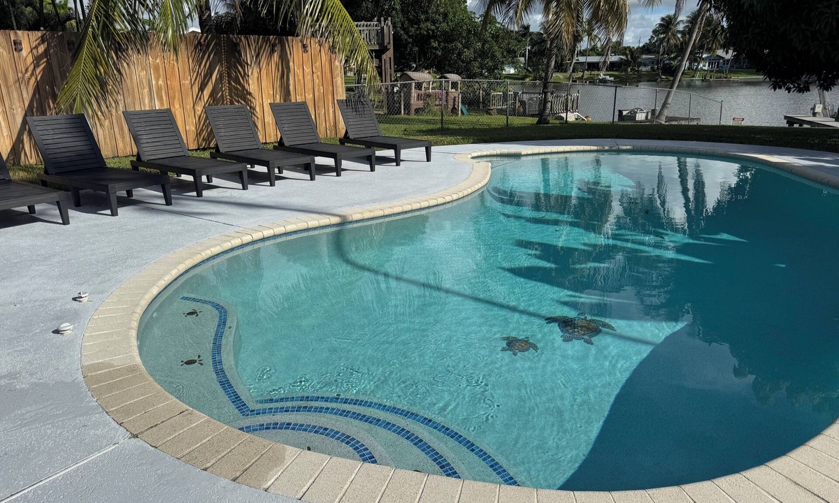 Lake Worth House | Luxury Lakefront Retreat with Heated Pool, Tiki Lounge, Dock, Gym & EV Charger