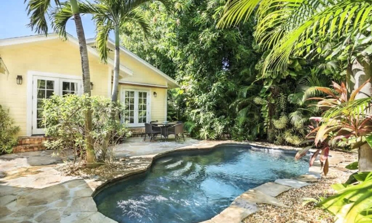 Flamingo Parks House | Mango Haus - Savor Tropical Living by a Lush Lagoon Pool