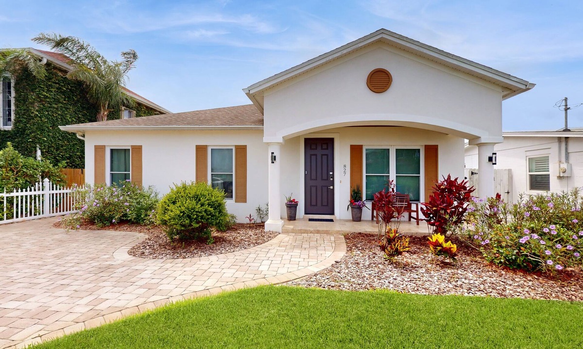 New Smyrna Beach House | Manicured home & pool house w/private pool - short walk to the ocean