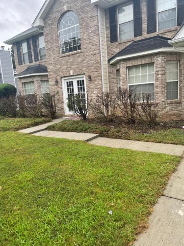 Lithonia House | Master bedroom with full bathroom