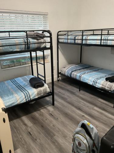 Liberty City Hostel | Miami Coliving shared House for professionals