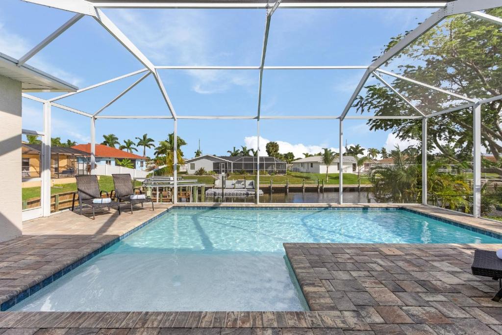 Caloosahatchee House | Minutes to the River!, Dock and Pool - Villa Gold Coast - Roelens Vacations