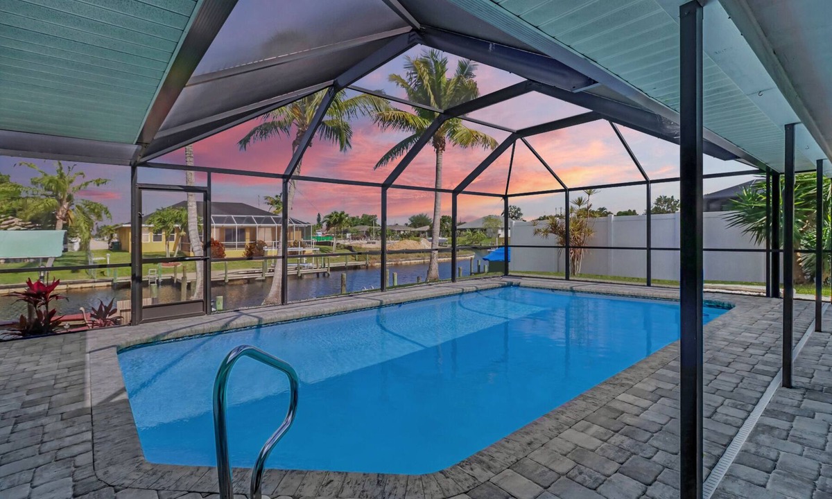 Cape Coral House | Modern Coastal Waterfront Retreat with Heated Pool & Dock