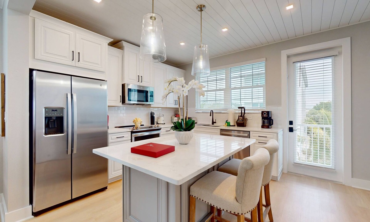 Cortez House | Modern home with screened-in balcony, pool, bikes, & EV charger - great location