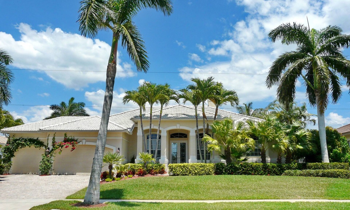 Marco Island House | Modern waterfront home with pool/view of waterways