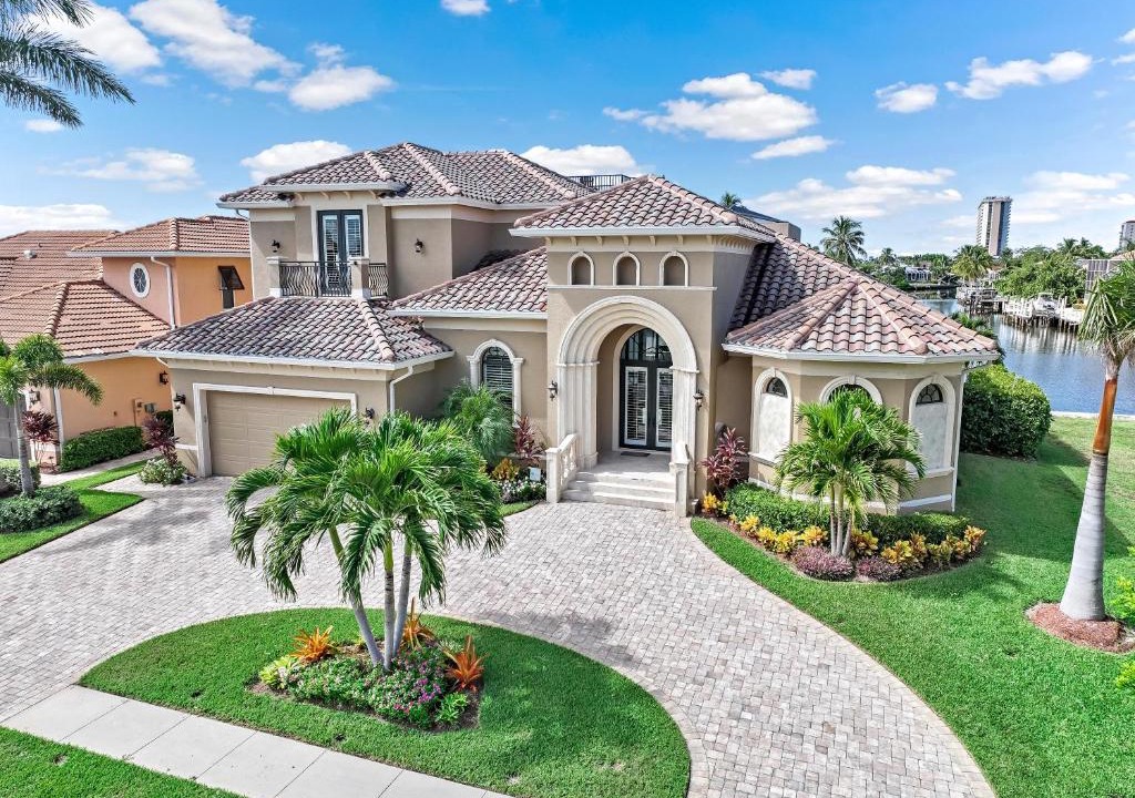 Marco Island House | Opulent waterfront home with pool, spa, dock and deck