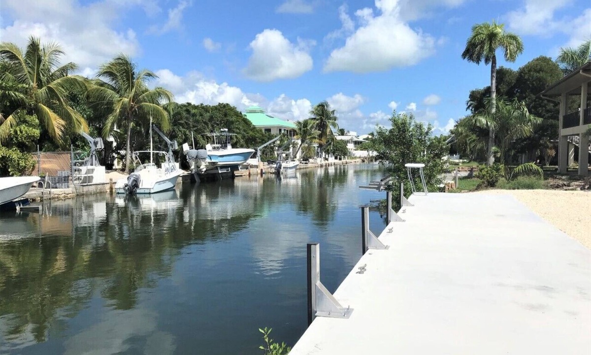 Cudjoe Key House | PARADISE 3 MINUTES TO OPEN WATER-60FT DOCK-WIDE CANAL RESERVE AREA-CUDJOE KEY