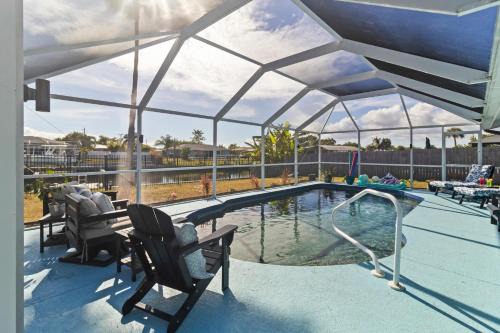 Port Charlotte House | Peaceful Canal-Front Retreat Pool, Kayaks