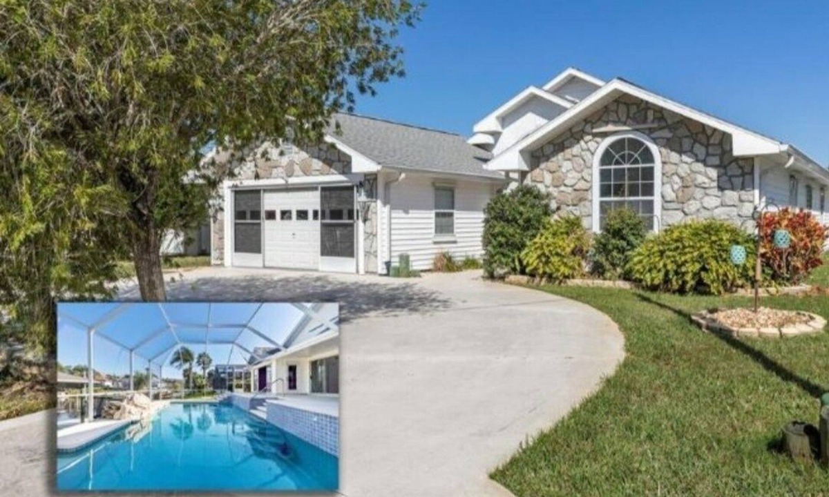 Palm Harbor House | Peaceful Waterfront Pool Home by RedAwning