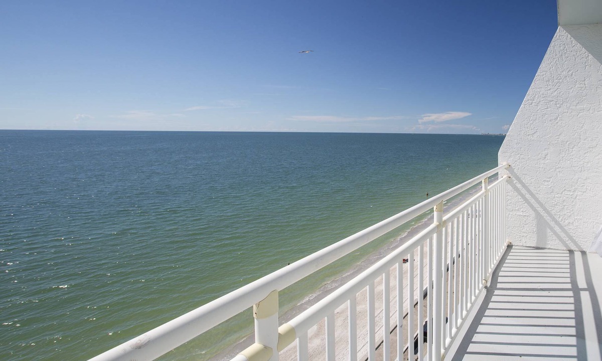 Sunset Beach Condo | Picture Perfect Views From Every Window! Corner Unit on Sunset Beach in Treasure Island.