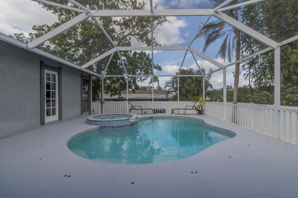 Whitney Beach House | Private 4 Bedroom Pool Spa Home Located on Palma Sola Blvd home