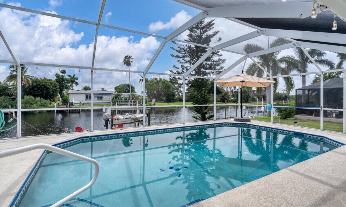 Punta Gorda House | Punta Gorda 3-Bedroom Canalfront Pool Vacation Home with Dock
