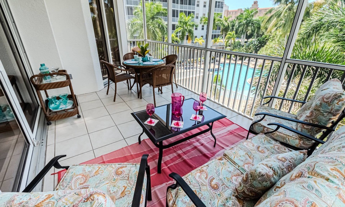 Vanderbilt Beach Condo | Regatta -Resort Style: 3BR/2BA -Lanai w/dining/conversational seating/pool view
