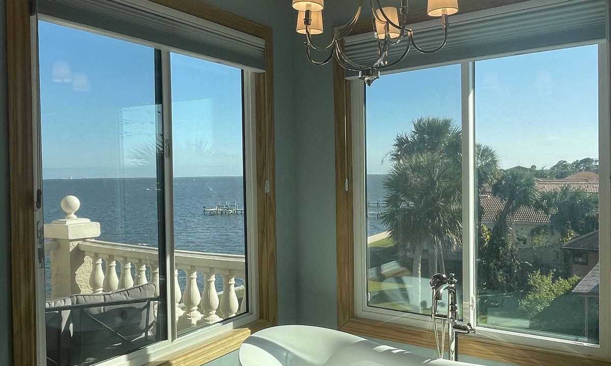 Titusville House | Rocket Launches and River Views! Multiple balconies, huge screened in porch.