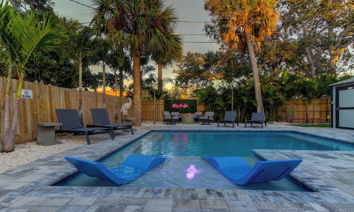 Indian Rocks Beach Cottage | Rockin Retreat- Triplex w/heated pool, Steps to beach, fire pitt, and putt putt