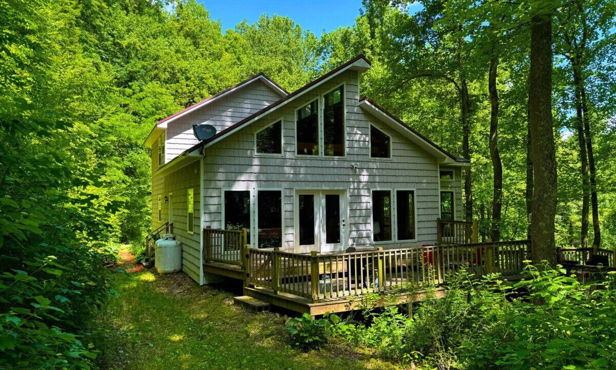 Hot Springs Cabin | Secluded Luxury Cabin with Private Waterfall, Mountain Views, Game Room, and Scenic Hiking Trails