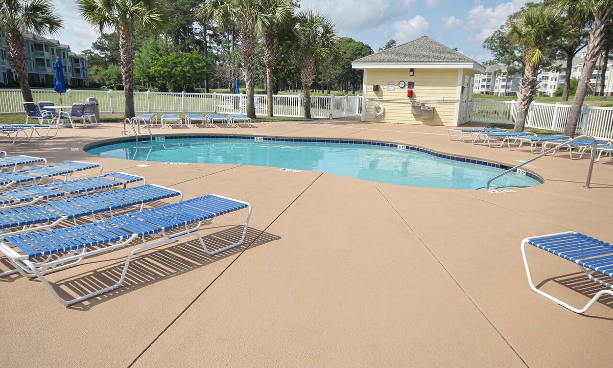 Central Myrtle Beach Condo | Serene condo with pool, balcony, full kitchen, washer/dryer, and TV