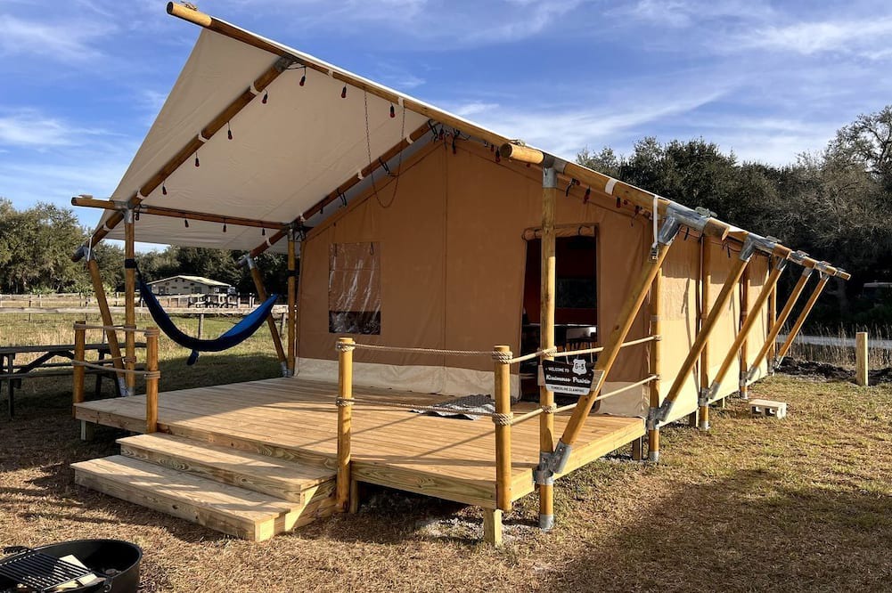 Okeechobee RV Rental | Spacious Deluxe Safari Tent with Fire Pit & BBQ Grill in Basinger, Florida