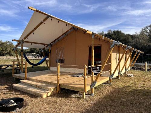 Okeechobee Other | Spacious Deluxe Safari Tent with Fire Pit & BBQ Grill in Basinger, Florida