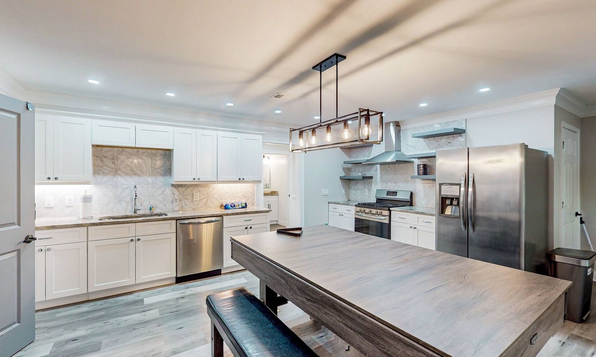 Roswell House | Spacious, dog-friendly home with home theater, game room & 2 kitchens