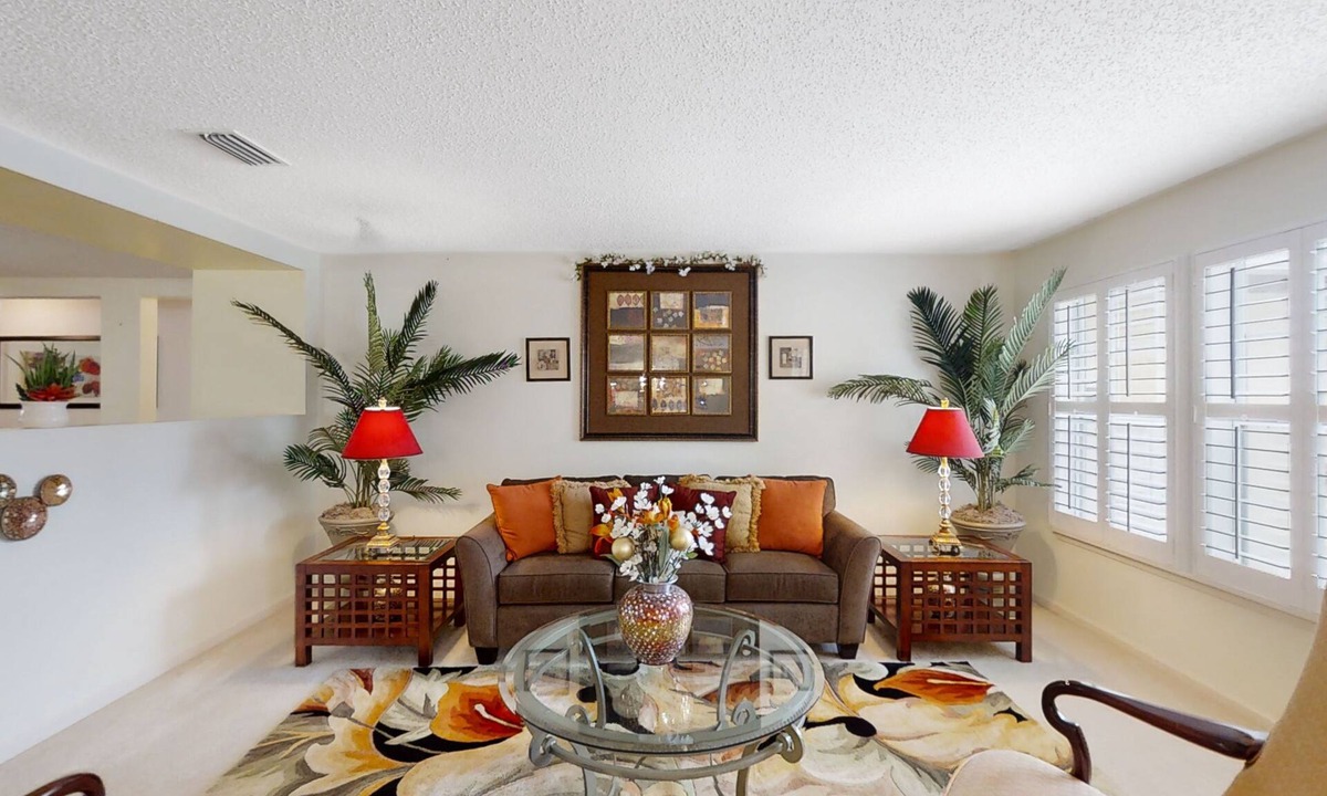 Westside House | Spacious home with sunroom, patio, fireplace, & water views